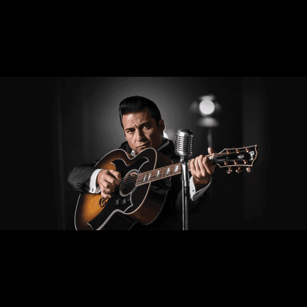 Johnny Cash Holding Guitar